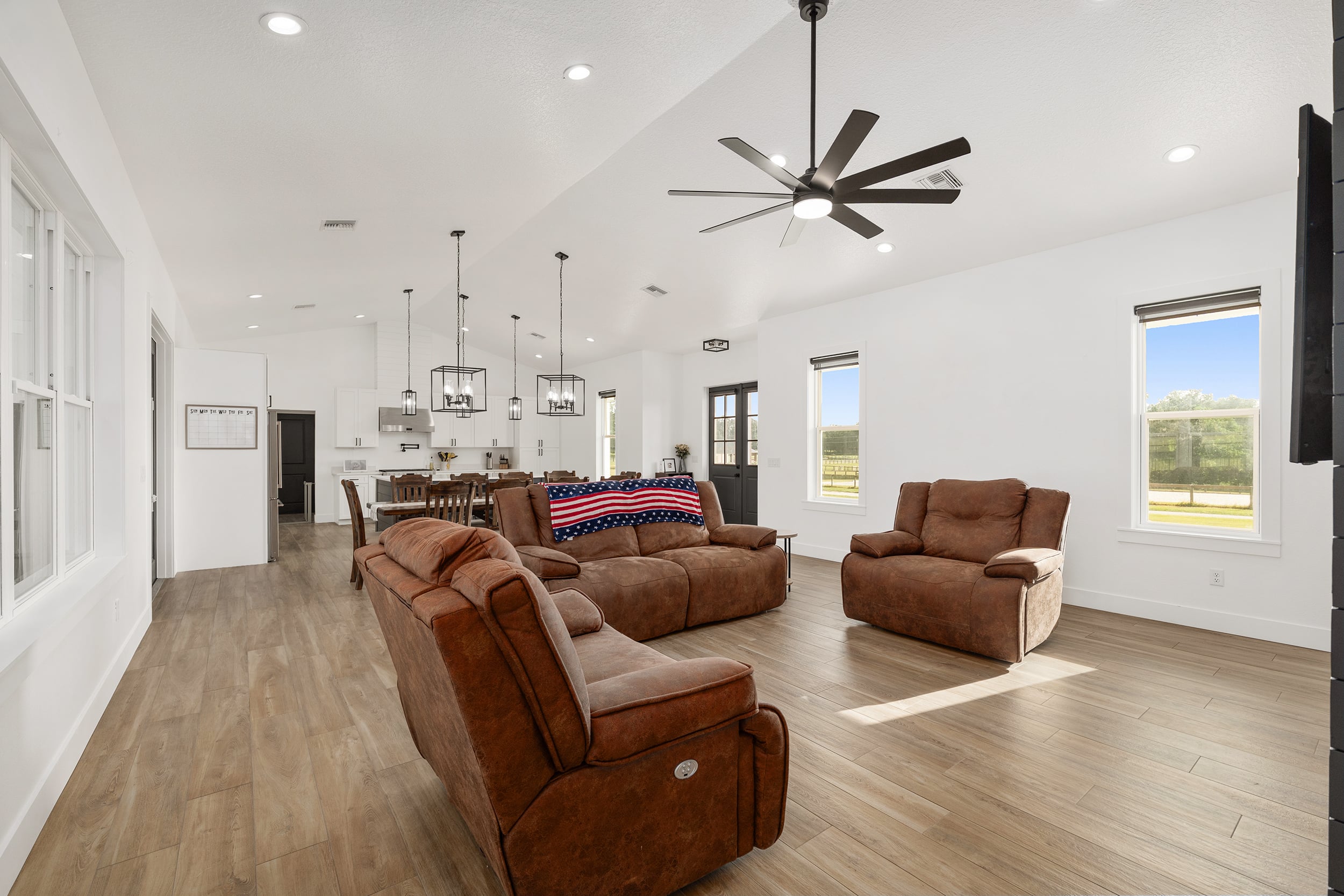 Open living room with leather seating