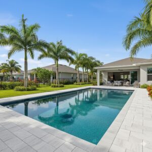 Luxury outdoor pool with palm trees